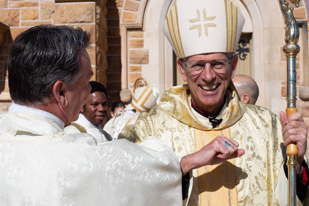 GREETING: Bishop Mark Edwards outside St Michael's Cathedral at his installation ceremony. Picture: Contributed