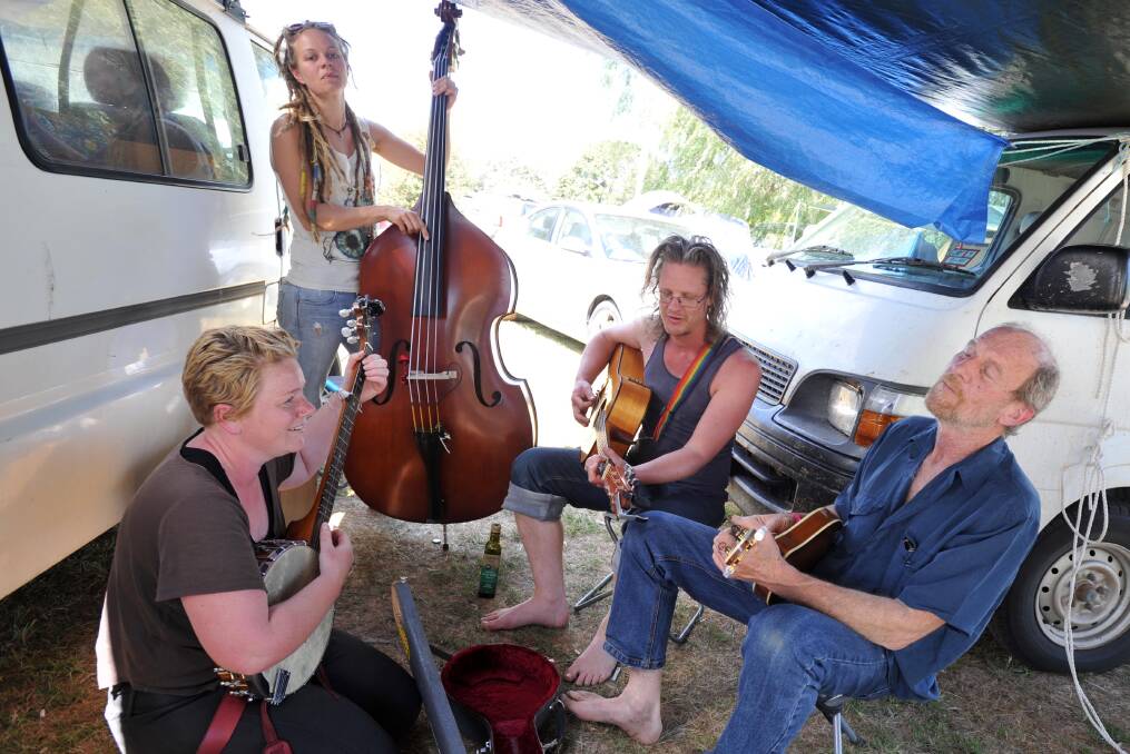 Visiting musicians Kate Crowley (Banjo), Amy Pinkster (Double Bass), Rob Moss (Guitar) and Andrew Schrape (Mandolin) at the Uranquinty Folk Festival in 2014.
