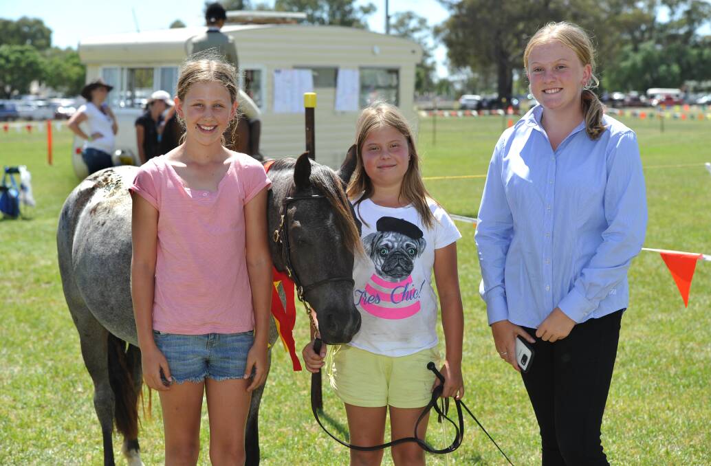 INVOLVED: Kaylah Upfield 10, Jade Tapfield 10 and Georgia Shaw 13 enjoy their day at the Henty Show earlier this year.