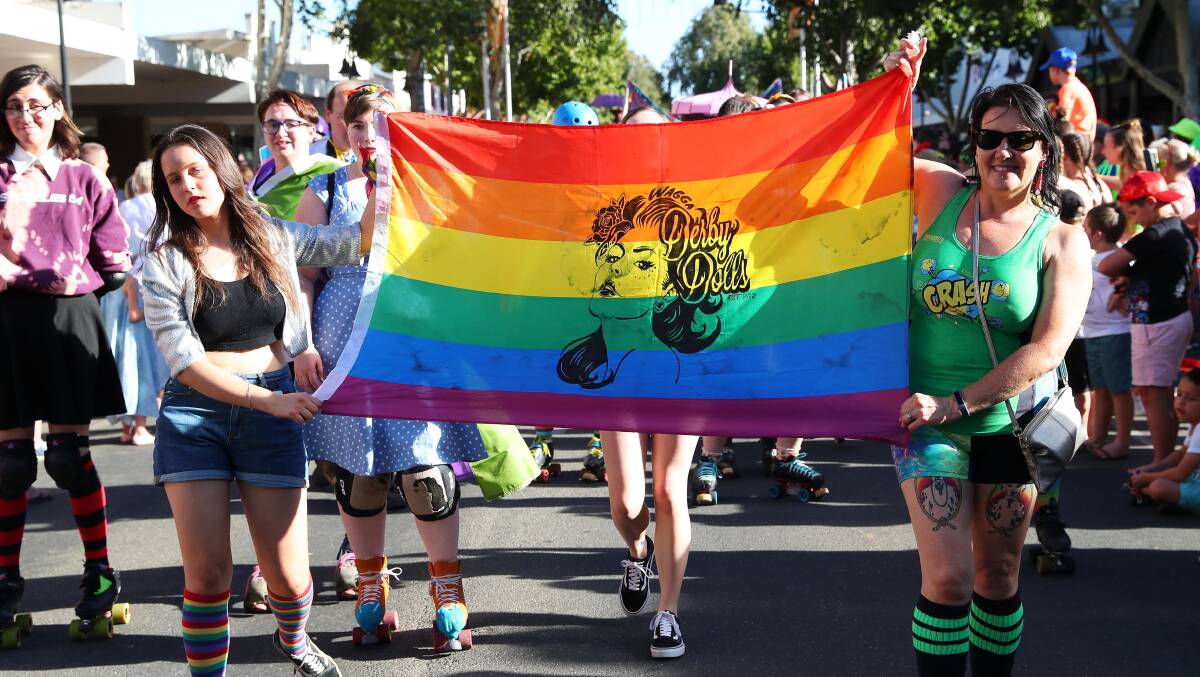 Revellers enjoy the march at the Wagga Mardi Gras 2019.