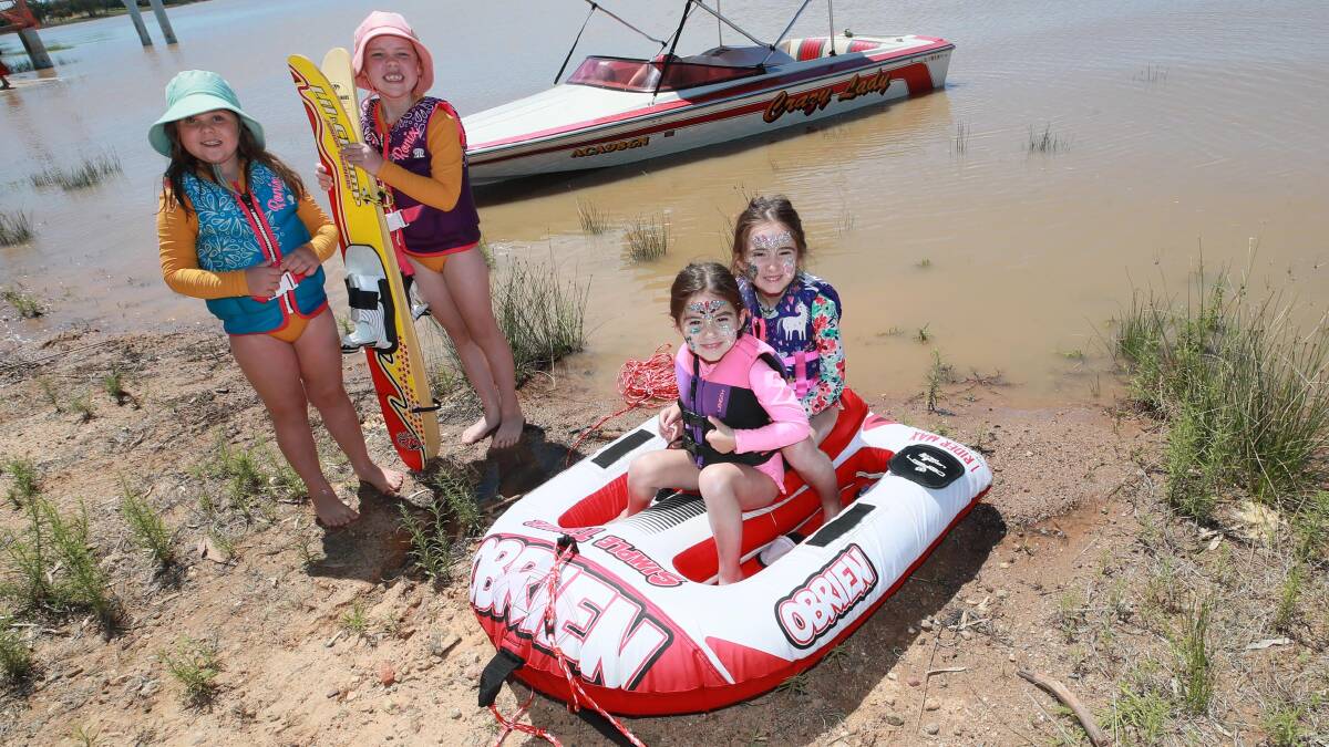 ON THE WATER: Five-year-old Emily Croker with her six-year-old sister Grace Croker and four-year-old Aria McDonell and her five-year-old sister Tiger McDonell, enjoying the lake. Picture: Les Smith