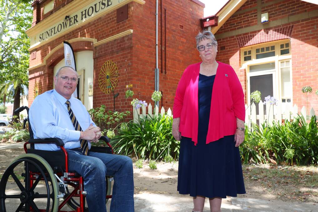 COMMUNITY: Sunflower House president Mark Horton thanks Elizabeth Furner from the Riverina CWA Group for their fundraising efforts in 2020. Picture: Emma Hillier