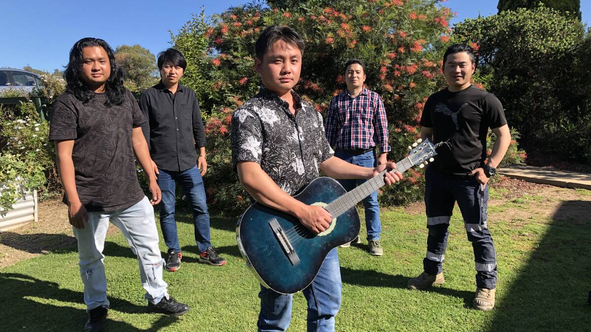 RVZI: Burmese musicians Phongsar Konglang, Phong Ram Nang Hee, Pi Dang Rapma, Pongram Rawang and Po Tiwangce hope to help refugees in Malaysia through their music. Picture: Rachel McDonald