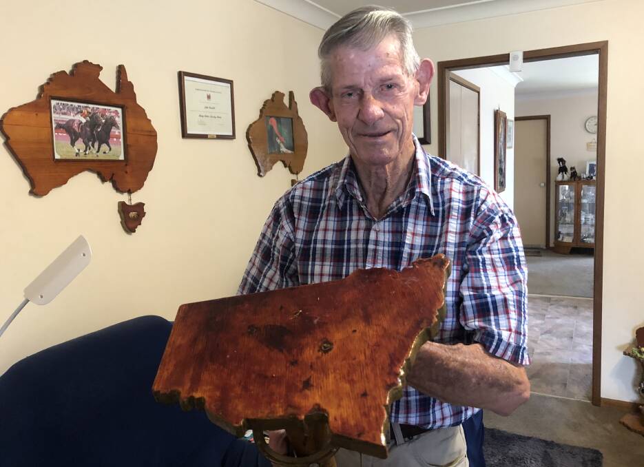GENEROUS: John Fardell has spent over a decade making Australian-themed coffee tables to raffle off for charity. Picture: Rachel McDonald