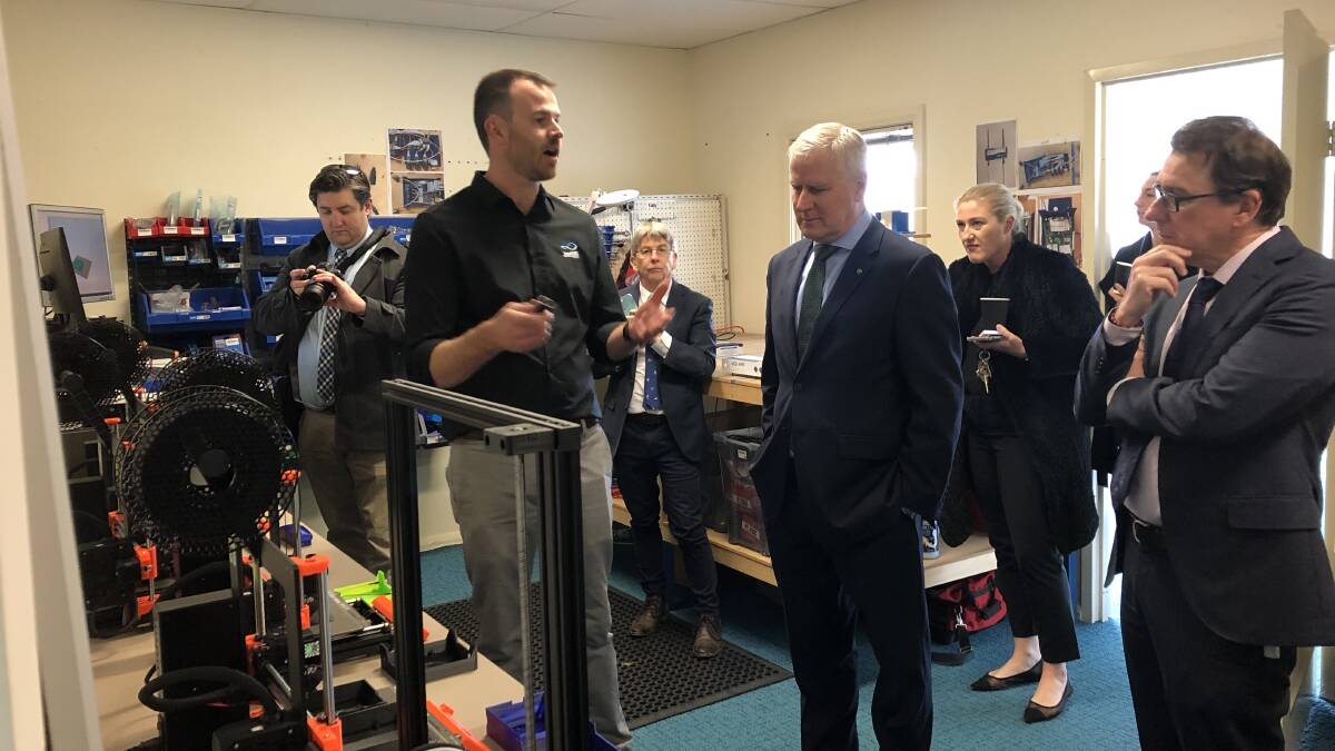 LAUNCH: Zetifi CEO Daniel Winson takes Member for Riverina Michael McCormack and Member for Wagga Joe McGirr on a tour of the start-up's new premises. Picture: Rachel McDonald