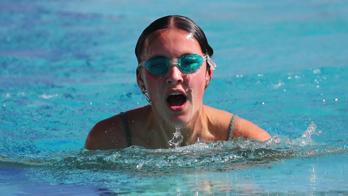SENIORS: Georgia Hallam, 17, competes in the senior breaststroke for her house at the Kildare swimming carnival at Oasis Aquatic Centre on Thursday. Picture: Emma Hillier