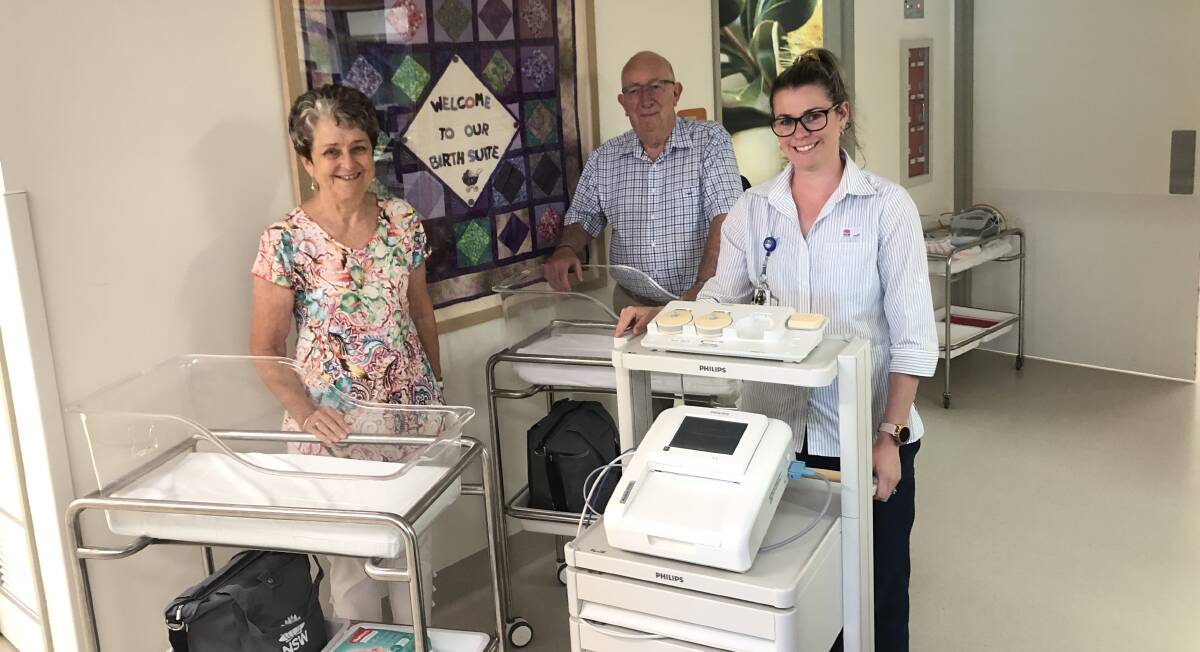 GIFTS: Wagga Hospital Auxiliary secretary and president Elizabeth and Rodney Parsons with midwifery unit acting manager Amy Baulch, inspecting the new equipment. Picture: Rachel McDonald