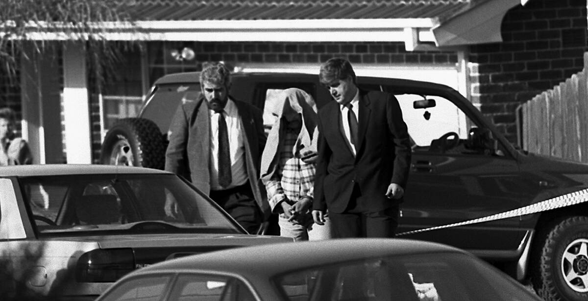 NSW police taking away Ivan Milat from his Eaglevale home after an early morning raid in 1994. Photo: Rick Stevens