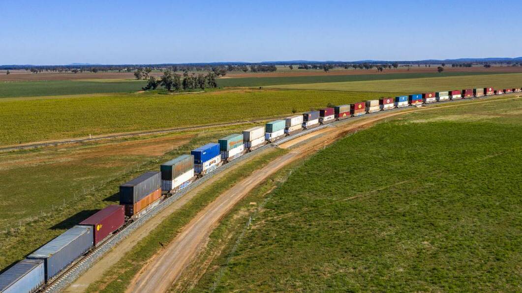 A double-stacked freight train at on the upgraded Inland Rail line at Parkes. The Senate Rural and Regional Affairs and Transport References Committee has now released a report titled 'Inland Rail: derailed from the start" that warned community and industry support for the project is at risk. Picture: ARTC