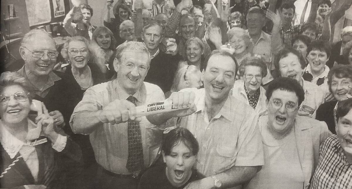 Previous Wagga MP Joe Schipp hands the Liberal Party baton to Daryl Maguire after he declared victory on the night of the NSW election on March 27, 1999.
