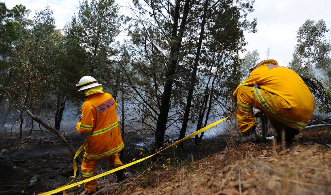 The Rural Fire Service responds to a bushfire on Willans Hill in 2011. The state government will charge councils an increased emergency services levy from July 2019.