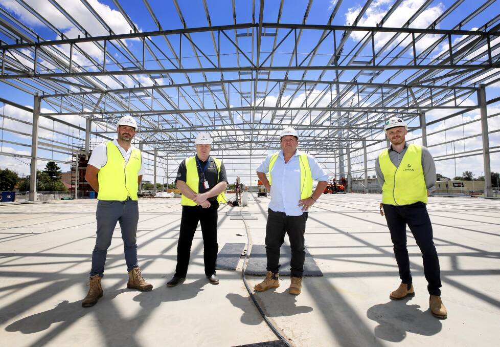 FRAME: Lipman construction's Andrew Middleton, Lester Stump and Mitchell Jeffries with PCYC Wagga manager Wayne Flood (2nd from left) at the new stadium site. Picture: Les Smith
