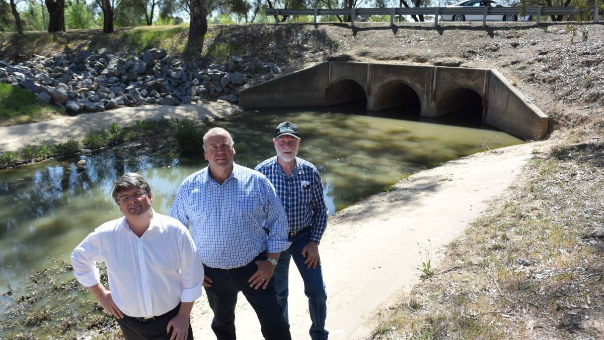  Wagga City Council general manager Peter Thompson, Councillor Paul Funnell and Lake Albert Forum member Gary Williams at Lake Tatton Drain in October.
