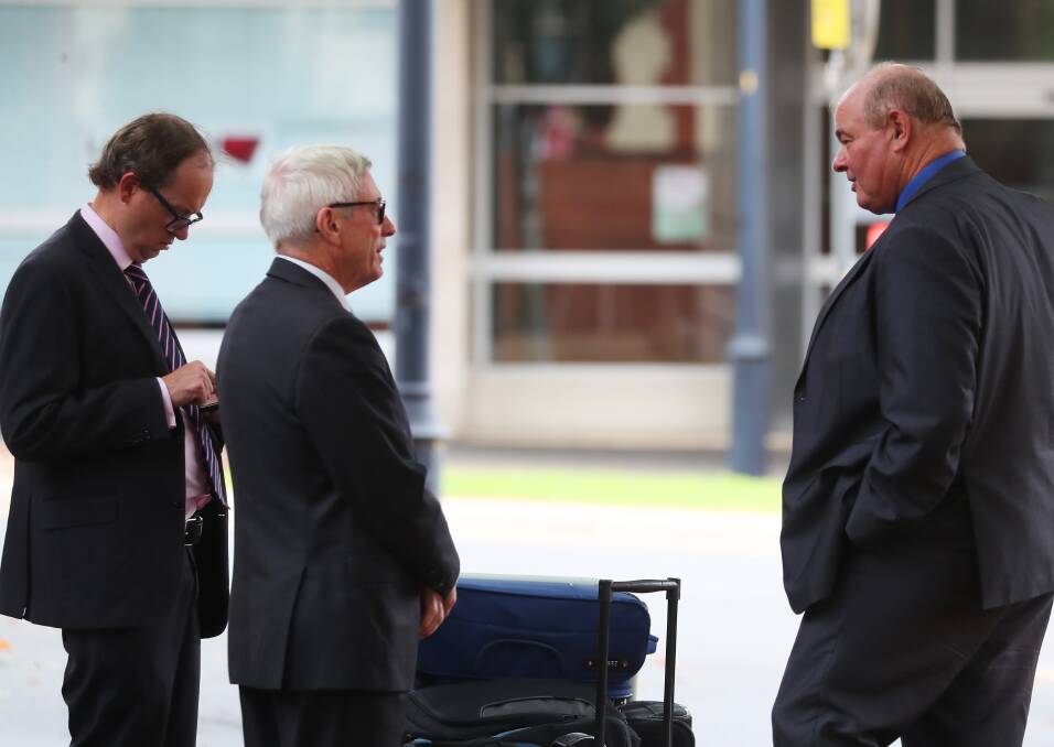 CASE: Former Wagga council general manager Alan Eldridge (right) outside court on Thursday with his senior counsel John Fernon (centre) and barrister David Mackay. Picture: Emma Hillier