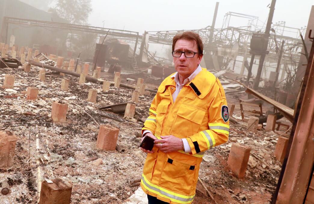 Wagga MP Joe McGirr surveys the utter destruction to the remaining part of the old Mountain Maid cannery.