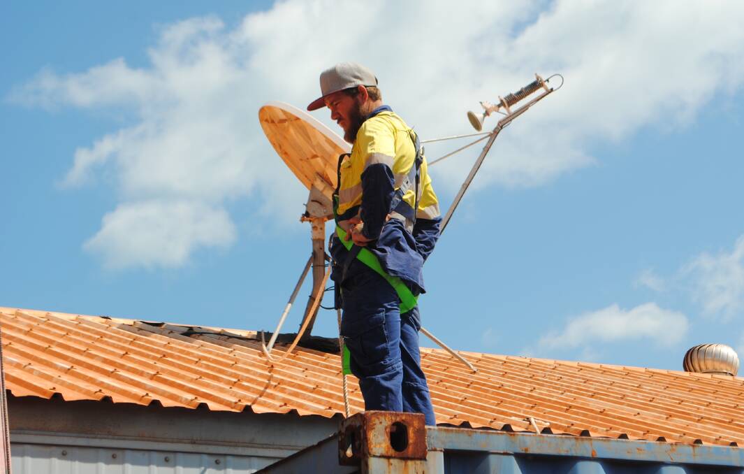 A National Broadband Network roof-top antenna is installed for its satellite internet service. Picture: nbn 