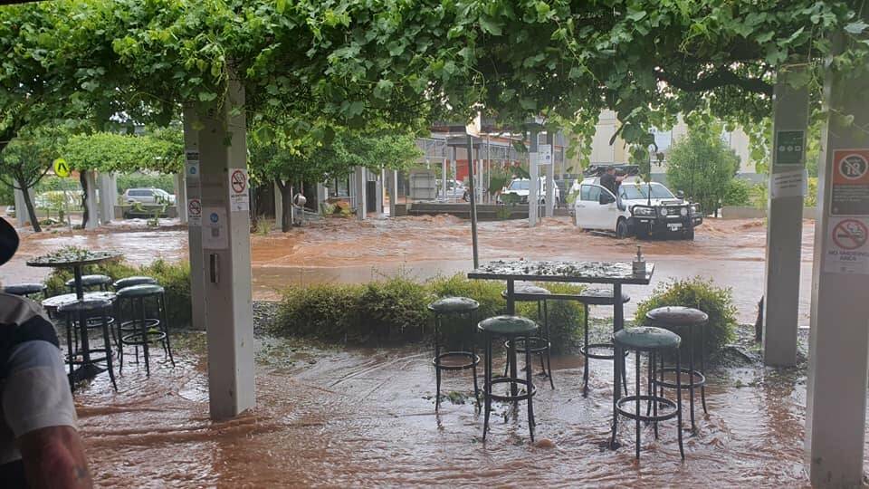 Flooding in Parkes on Saturday. More severe thunderstorms have been forecast for the Riverina on Sunday. Picture: Parkes Champion-Post.
