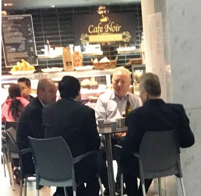 SNAPPED: Daryl Maguire (left) meets with Canterbury councillor Michael Hawatt and property developer Charbel Demian at a Sydney Cafe. Picture: ICAC surveillance