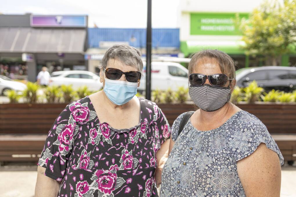 CAUTION: Patricia and Toni Daly, both from Temora, were in the minority of shoppers who opted to wear masks in Wagga yesterday. Picture: Ash Smith