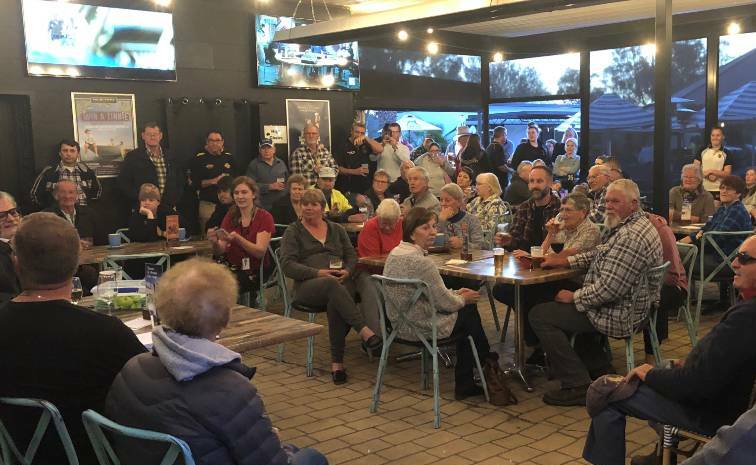 North Wagga residents gather at the Palm & Pawn Hotel last month to receive an update on their fight to increase flood protection.