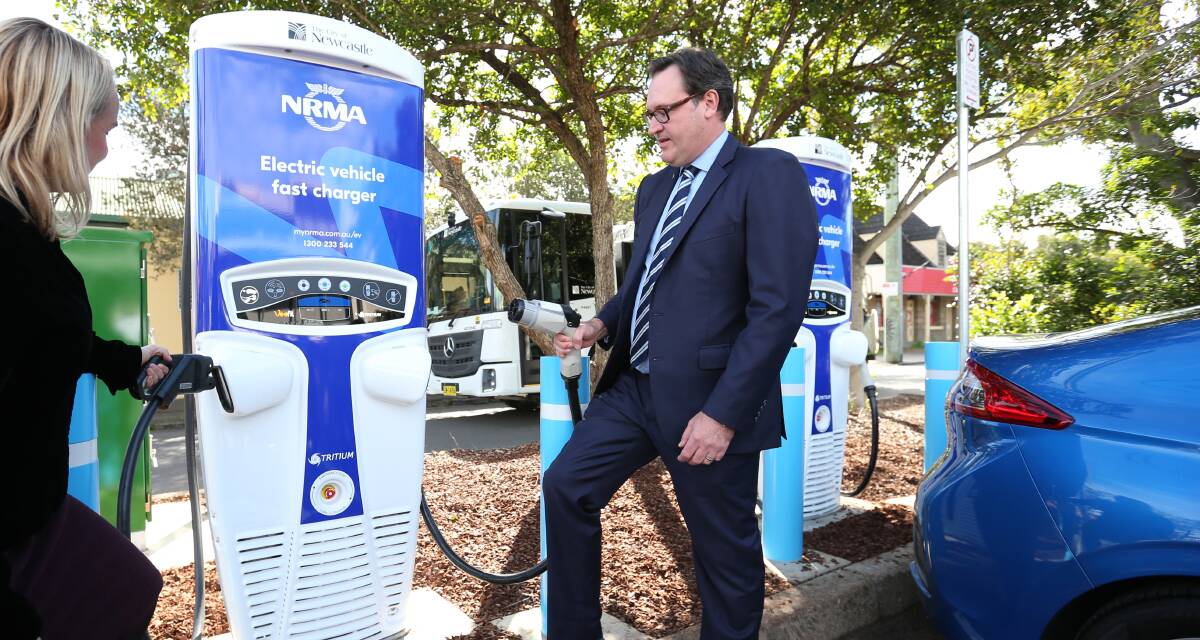 NRMA's Michael Gabriel with a 'fast charger' for electric vehicles in Newcastle. A similar charger could be built in Wagga. Picture: Simone De Peak