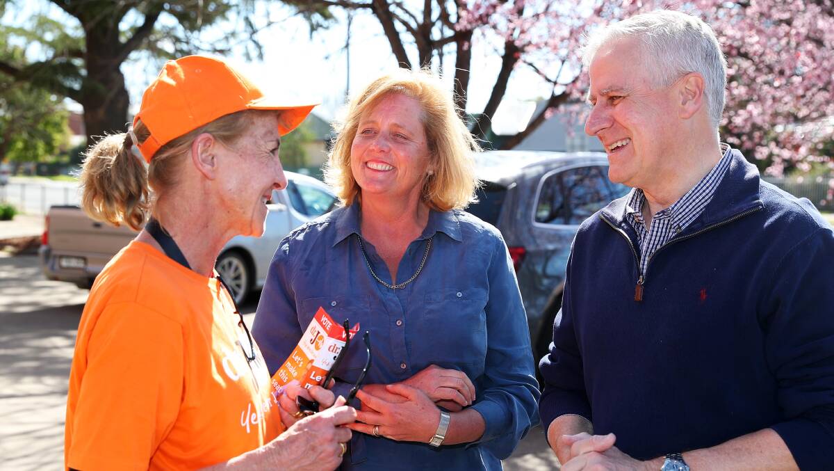Riverina MP Michael McCormack campaigns in the Wagga byelection on Saturday with Liberal candidate Julia Ham (centre) outside South Wagga Public School. Picture: Emma Hillier
