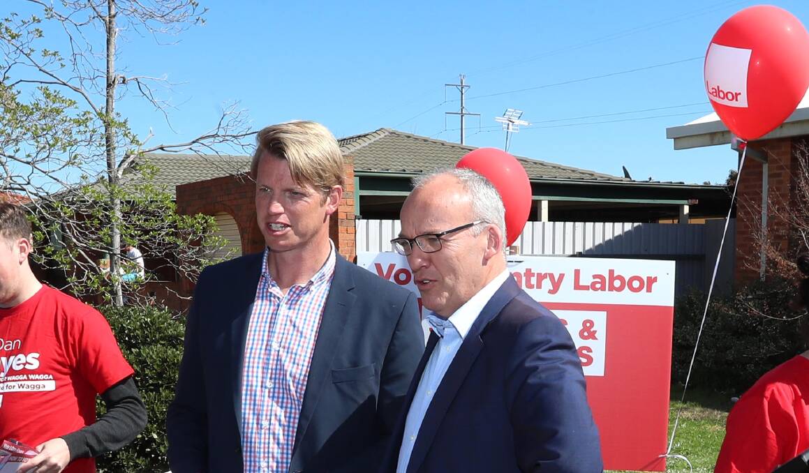 Wagga Labor candidate Dan Hayes and then Labor leader Luke Foley campaign together on polling day for the Wagga byelection in September.