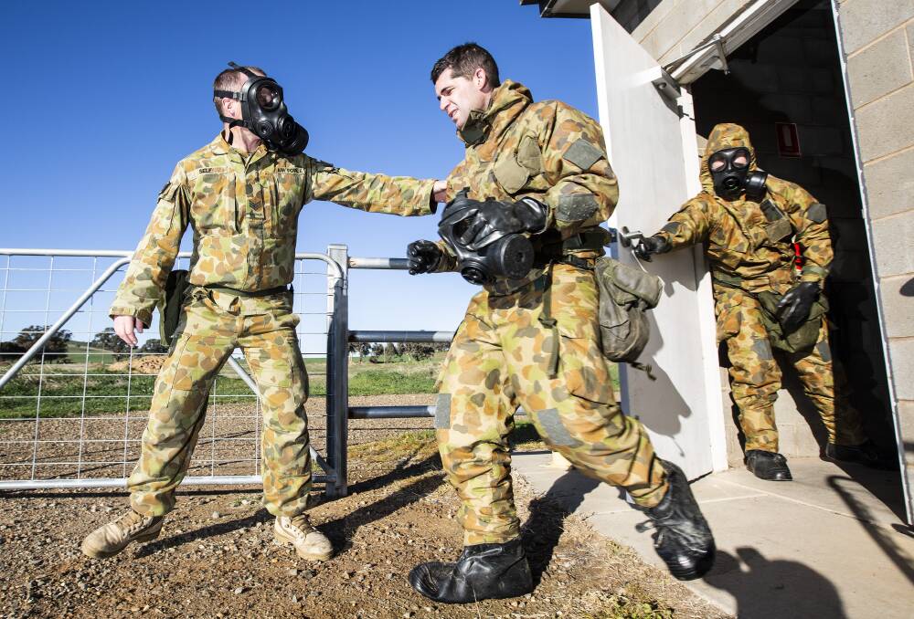 A Royal Australian Air Force recruit takes part in simulated chemical, biological, radiological and nuclear defence training at No 1 Recruit Training Unit, which is based at RAAF Wagga. Picture: Defence.