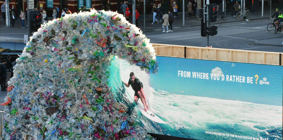 A 1580kg plastic 'Wave of Waste' represents the amount of plastic entering Australia's oceans every hour ahead. Picture: Joe Armao.