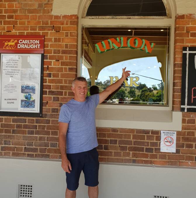 INSURANCE LOSS: Tumbarumba's Union Hotel licencee Martin Wilton pictured in front of his pub in early December before the bushfires hit. Mr Wilton's insurer turned down claims worth nearly $200,000. Picture: Contributed