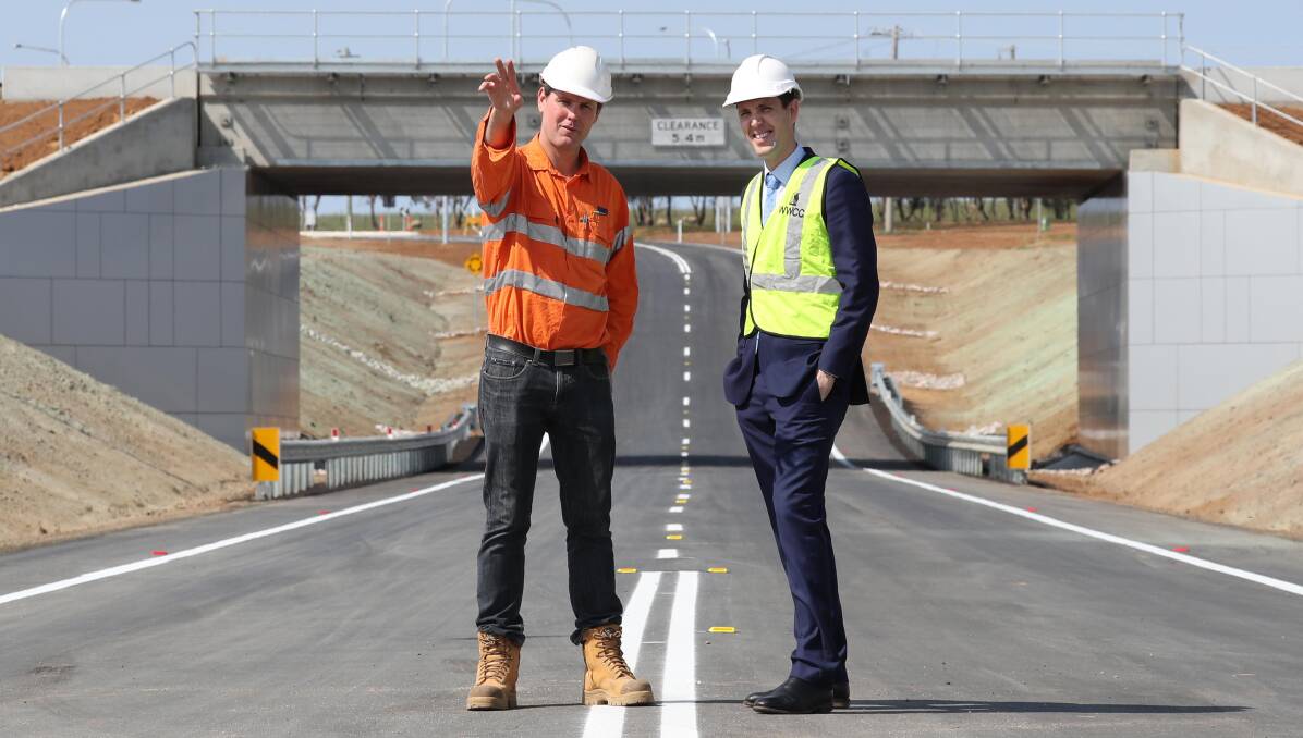BMD Constructions Project Manager Mark Gallagher (L) with then acting Wagga City Council General Manager James Bolton at the opening of new access roads into Bomen in 2017 as part of a push for more industrial businesses in Wagga. 