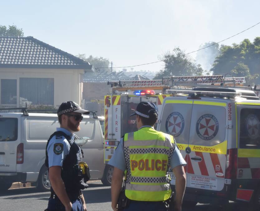 DANGER: Wagga Police, NSW Ambulance and Turvey Park Fire and Rescue respond to Tolland house fire. Picture: Rex Martinich
