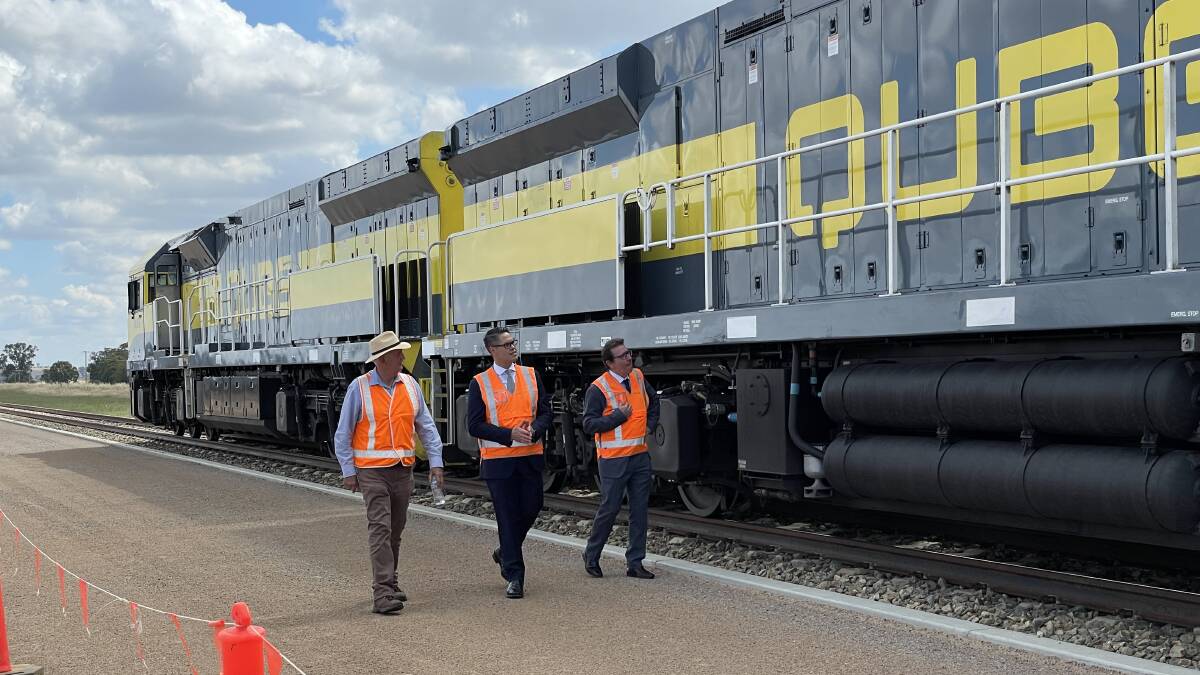 NEW LINE: Wagga mayor Greg Conkey, Wagga-based Nationals MLC Wes Fang and independent Wagga MP Joe McGirr inspect a locomotive on the Riverina Intermodal Freight Hub's new siding. Picture: Rex Martinich