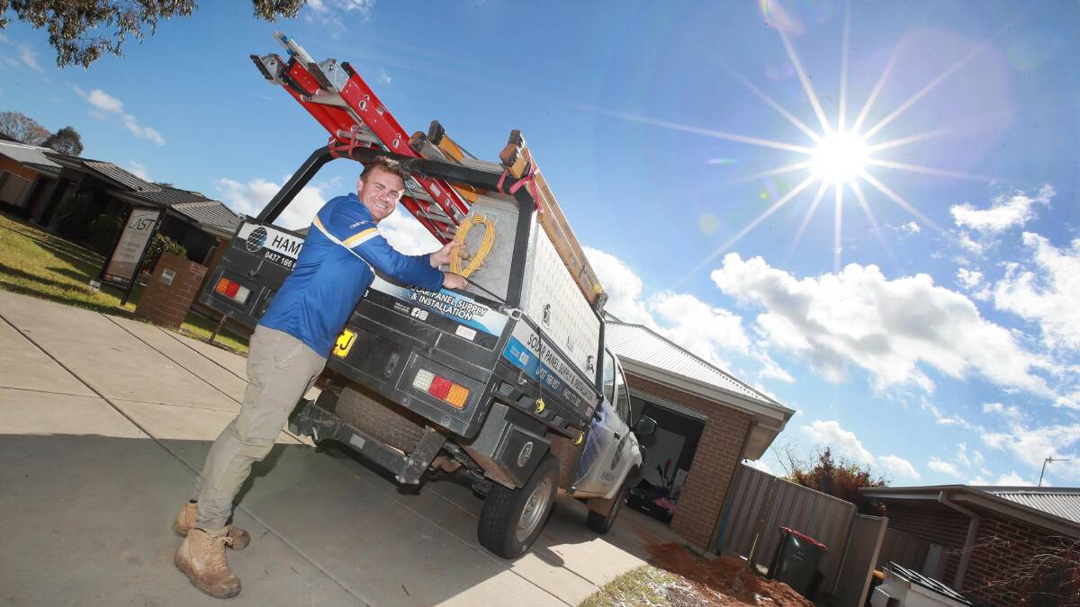 DEMAND: Kirk Hamblin, the co-owner of Hamblin Solar, has been busy installing solar panels at Wagga homes over the past few months in which 650 locations have taken up small-scale rooftop installations. Picture: Les Smith