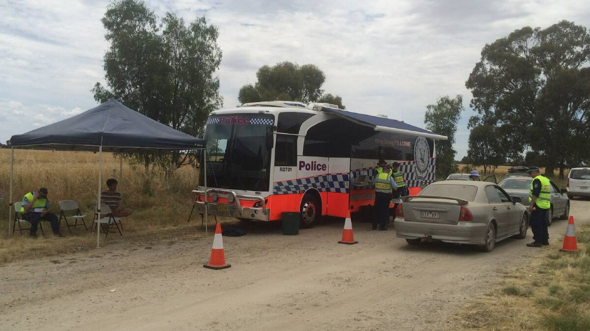 Police test for drugs and alcohol at the Strawberry Fields Festival in 2016.