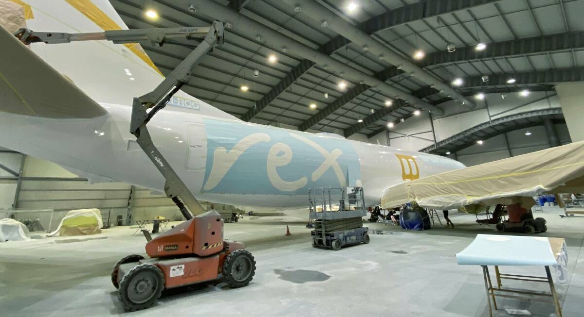 Regional Express paints its livery on a newly-leased Boeing 737. The airline has secured $150 million in external funding to launch the new jet service. Picture: Regional Express/twitter