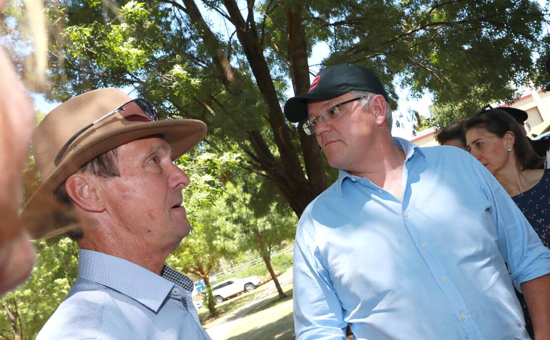 Snowy Valleys mayor James Hayes and Prime Minister Scott Morrison in Tumbarumba on Wednesday. Picture: Les Smith