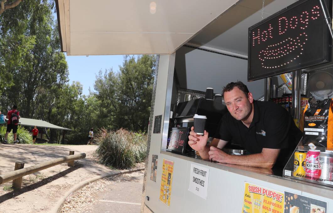 OPEN: Kirky's Coffee van owner Luke Kirkman, from Ganmain, offers food and drinks at Wagga Beach during the mobile food vending trial.