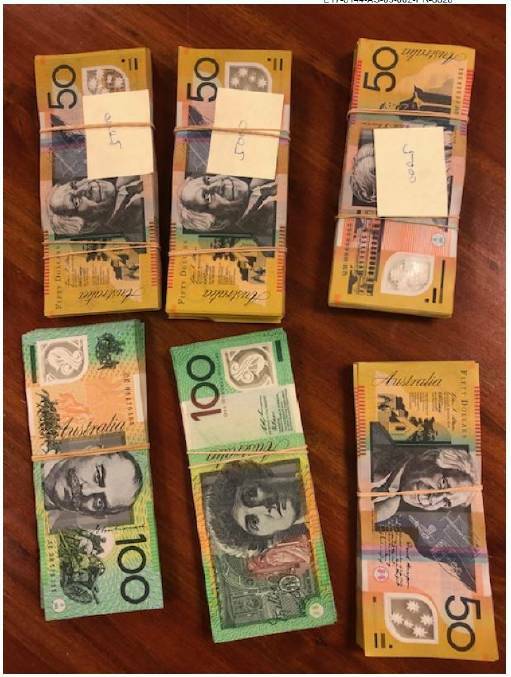 More than $27,000 in cash that a Wagga business owner told ICAC was leftover from a bag supplied by an alleged associate of former Wagga MP Daryl Maguire. Picture: ICAC