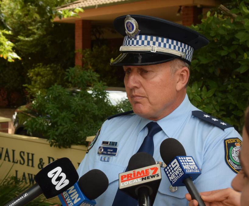 Acting Detective Inspector Phil Malligan holds a press conference on the robbery of a txi driver at gunpoint in Wagga on Tuesday morning.
