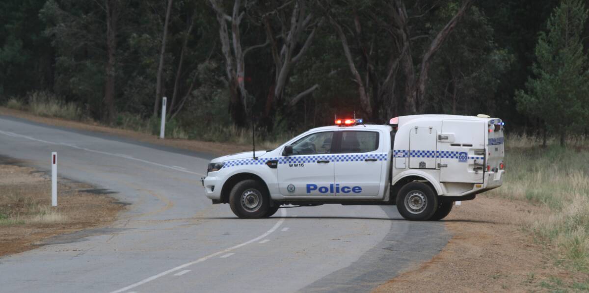 A police vehicle blocks Gregadoo East Road at Gregadoo on December 19, 2021 after Riley Ben Martyn crashed his utility vehicle into a tree while having a blood alcohol level of 0.180. Picture: Daisy Huntly