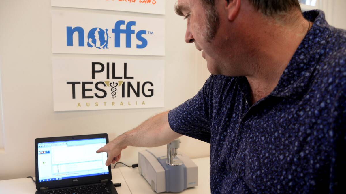 DEMO: Dr David Caldicott, explains a pill testing medical service for music festivals at the Ted Noffs Foundation in Sydney. Picture: AAP/Jeremy Piper
