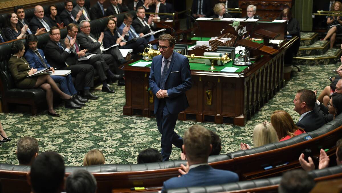Wagga MP Joe McGirr takes up his new seat in NSW Parliament after being sworn in on Tuesday. Picture: AAP/Joel Carrett