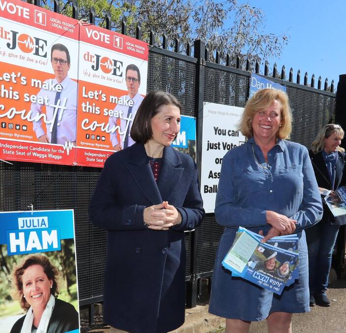 NSW Premier Gladys Berejiklian and Liberal candidate Julia Ham campaign in the byelection outside Sturt Public School.
