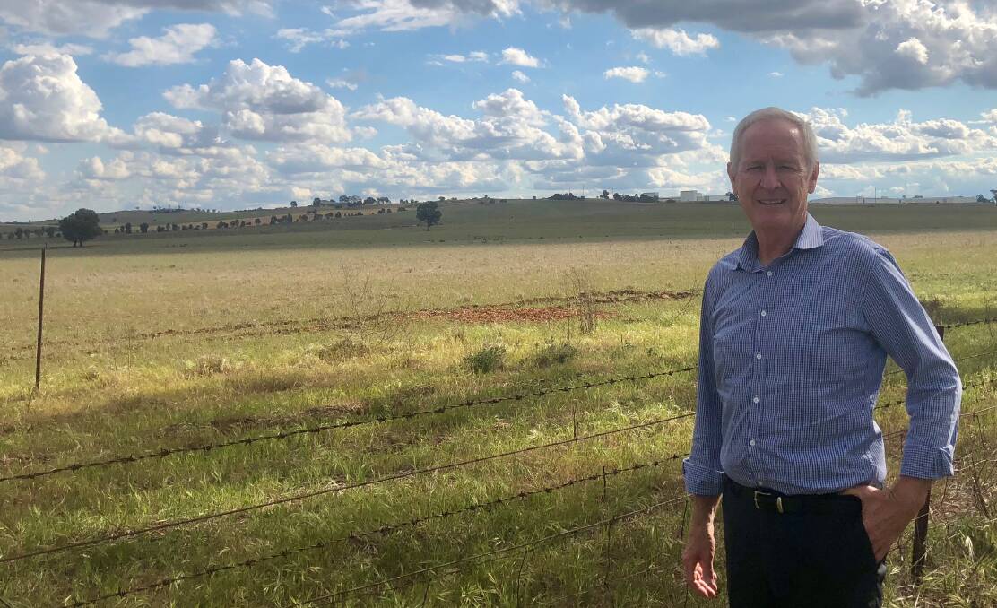 Renew Estate's project coordinator Chris Fitzpatrick  in 2018 at the Bomen site where the $188 million solar farm will be built. The company has now sold the project to Spark Infrastructure. 