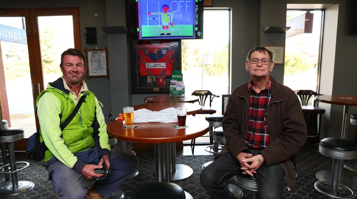 THE PUB TEST: Matthew Nixon and Heinz Schulz at the William Farrer Hotel on Tuesday thought MPs should have to pay for their own trips to the Melbourne Cup. Picture: Emma Hillier. 