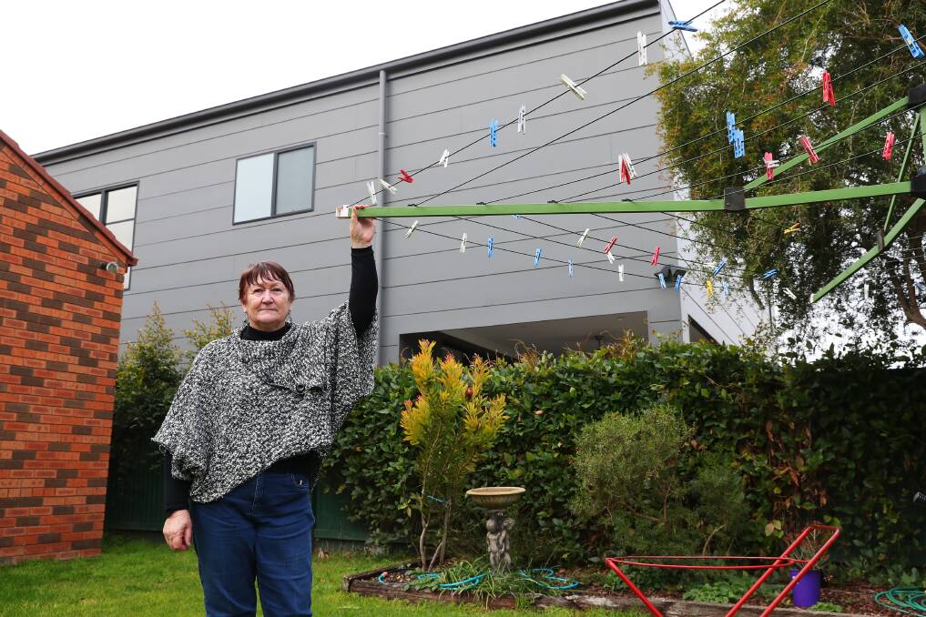 IMPACT: Forsyth Street resident Margaret Whalan says her privacy and access to light have been affected by two-storey housing next door. Picture: Emma Hillier.