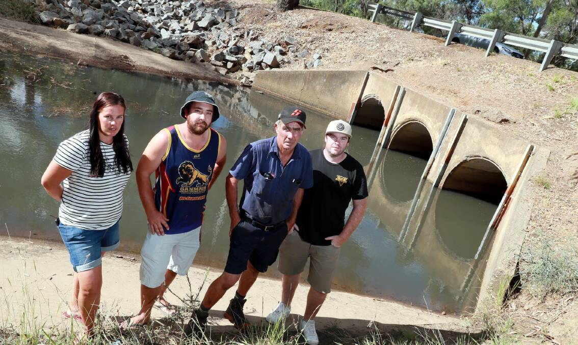 Wagga Boat Club commodore Mick Henderson (second from right) receives support from concerned community members Jacinta Evans, Alex Crawford and Chris Ingram. Picture: Les Smith