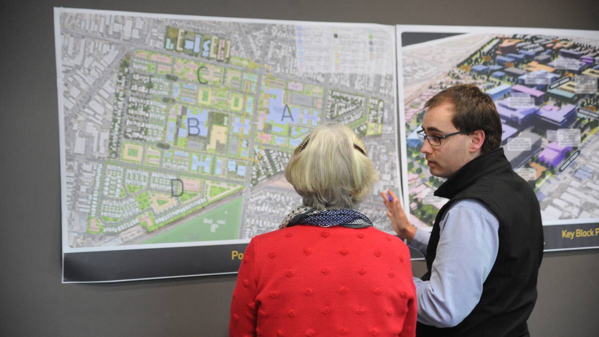 Wagga City Council's strategic planner Adam Wood answering questions at the Health and Knowledge precinct community drop-in session. Picture: Daina Oliver