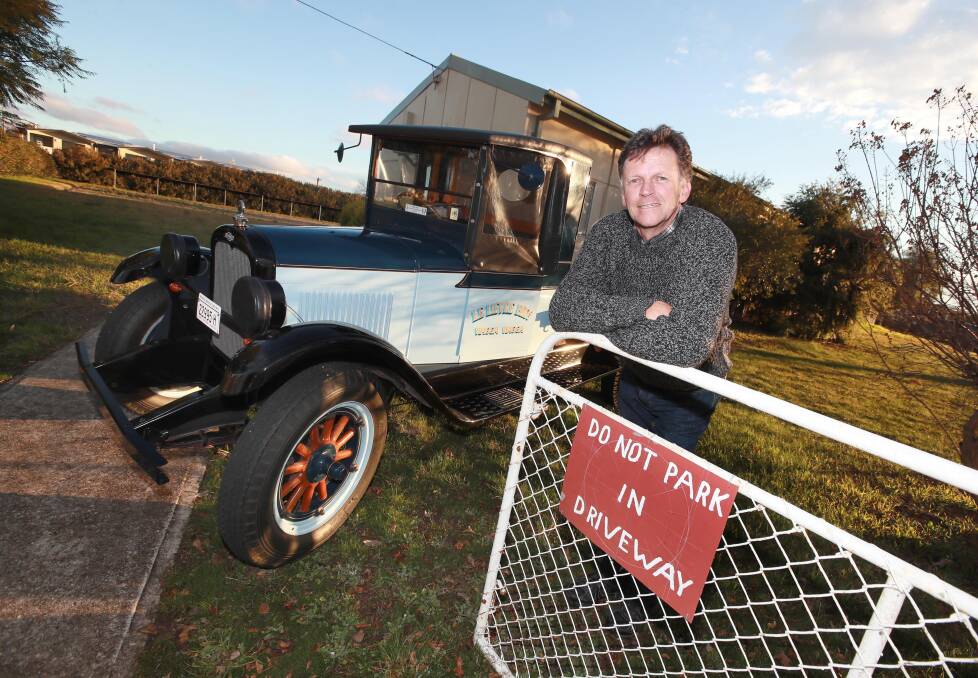 MOVING: Vintage and Veteran Motor Club member Rob Le Lievre and his 1928 Chevrolet 30 cwt truck at the future site of the group's new clubrooms on Shaw Street. The club will share the site with U3A and other groups. Picture: Les Smith